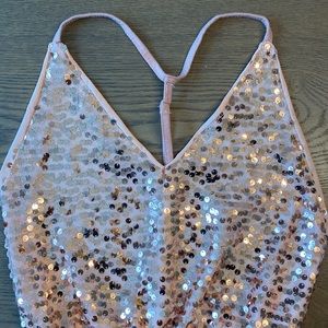 Small, sequin, pink bodysuit.